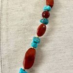 Brass elephant pendant necklace with carnelian, turquoise and red jasper beads Photo 4