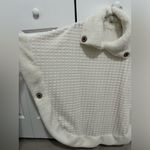 White poncho sweater with cute button detail! Size undefined Photo 2