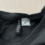 Divided Graphic Baby Tee Photo 1