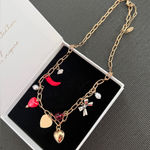 Free People  Gold Charm Necklace with Red and Silver Accents Photo 0