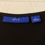 Apt. 9  Jumpsuit size L beautiful kind of silky feelings color black inseam is 26” Photo 2