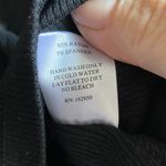 Chic Black Long Sleeve Top with White Bow Details Size M Photo 6