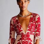 For Love & Lemons deep V-neck Layered
Lace Mini Dress in Wine Photo 3