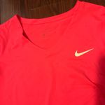 Nike Women’s hot pink white  athletic top Photo 1