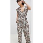 Free People  X Revolve Ruffle Your Feather Floral V-Neck Jumpsuit. Size S Photo 2