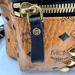 COGNAC MCM VISETOS STARK
STUDDED BACKPACK MEDIUM Photo 14