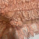 NBD  Revolve Secrets Revealed Lace
Asymmetrical Romper in Dusty Rose Sz XS Photo 7