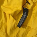 EXPRESS  yellow/gold off the shoulder romper Photo 2