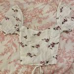 Isabelle's Cabinet Isabelle’s Cabinet Open Back Top Photo 1