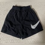 Nike Black Athletic Shorts with White Swoosh Photo 0