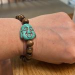 Budha bracelet turquoise with brown beads Photo 1
