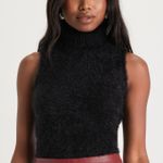 Jessica Simpson  Fuzzy Black Turtleneck Photo 0