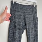 Athleta Women’s Cut Out Leg Space Dye Chaturanga Leggings in Grey Size Medium Photo 4