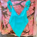 blue v neck frilly open back one piece swimsuit Size M Photo 0