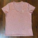Under Armour  Heatgear athletic wear loose fit short sleeve tee shirt, size XL Photo 1