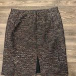 Tahari  pencil skirt.  Size: 12.  Small slit on back. Metallic thread throughout. Photo 2