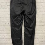 The North Face Women’s wind breaker pants Photo 2