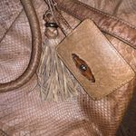 Elliott lucca tan duffel bag logo tassel leather $248 boho western luggage fall Photo 1