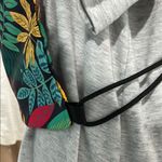 Wandf Backpack with Bold Tropical Design Black Photo 1