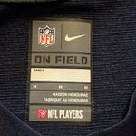 Nike NFL players women’s medium N.E Patriots Cam Newton jersey. Photo 1