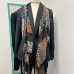 Stylish Black and Brown Patterned Scarf Photo 1