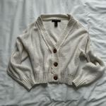 Forever 21 White cardigan with asymmetrical tortious shell buttons Photo 0