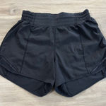 Lululemon Hotty Hot Short High-Rise Long 4" Women Size 6 Black Photo 0