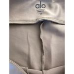 Alo Yoga  - Airlift High Waist Conceal Zip Capri Leggings in Brown Photo 2