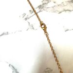 Gold tone dainty flower necklace Photo 7
