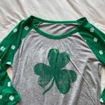 gray and green shamrock shirt Size M Photo 1