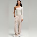 Lululemon NWT Wundermost Ultra Soft Nulu Long Sleeve One Shoulder Bodysuit Tan L Photo 1