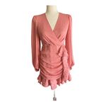 EXPRESS -FAUX WRAP MINI DRESS-SIZE XS V neck, faux wrap front, long sheer sleeves, ruched skirt with ruffles down the side, tiered ruffle hem, metallic fit fabric, fully lined except for sleeves, excellent condition, like new Measurements: Bust: armpit to armpit 16 1/2 inches Waist: side to side 13 inches Length: shoulder seam to bottom 32 inches Photo 4