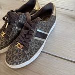 Michael Kors Brown and Gold Monogram Sneakers Photo 1