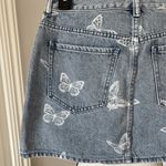 PacSun  new with tags butterfly denim jean skirt in a size 26 Photo 6