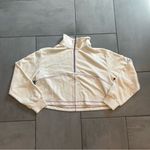 Sweaty Betty  Revive Half Zip Cropped Mock Neck Sweatshirt in Lily White Photo 1