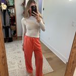 Amazon  orange wide leg sweatpants  Photo 0