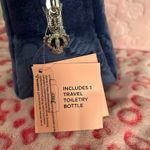 Juicy Couture royal blue velour makeup bag with silver crown logo embroidery on the front. Photo 2