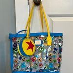 Lounge Fly  X Pixar Amazon exclusive Character pool beach Tote with zip coin case Photo 0
