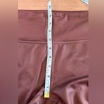 Athleta ELATION SHIMMER TIGHT IN POWERVITA cinnamon brown size large Photo 6
