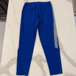 Under Armour Storm NWT Activewear Pants Womens Medium LooseFit Blue ZipperAnkles Photo 9