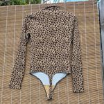 Lovers + Friends  Turtleneck Leopard Print Bodysuit with Long Sleeves in Tan Smal Photo 7