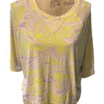 Fabletics  flourescent yellow and purple swirls on a cream tee. NWOT. Photo 0