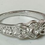 Silver Round Floral Diamond Cut Photo 1