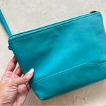 Open Story Like New Teal Leather Like Wristlet Cosmetic Case Photo 2