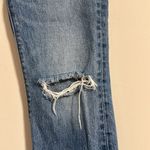 Levi's knee rip blue wash jeans size 24 Photo 1