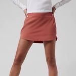 Athleta Run With It 14" Skort in Clay Orange Size Small Photo 0