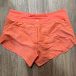 Athleta  Run With It‎ Textured 3.5" Running Shorts Coral Orange Size L Photo 0