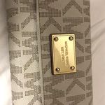 Michael Kors Cream MK Trifold Wallet Photo 0