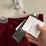 Beyond Yoga NWT  POWERBEYOND Midi Legging 2.0 Burgundy Size S Athletic Running Photo 2