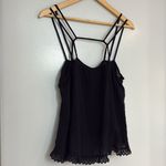 Free People  black strappy cutout flowy lace hem tank Photo 3